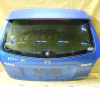 Дверь задняя Mazda Familia BJ5W '1998-2003 спойлер