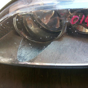 Фара Mazda лев 6 '2003 USA (внутри пыль)