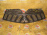 Решетка радиатора Mitsubishi L200 KA9T '2006-2010 7450A005 (Не крашенный)