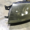 Фара MITSUBISHI лев RVR N71W Xenon черн.