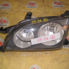 Фара TOYOTA лев Caldina ST215 '1997-1999 черн.