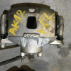 Суппорт NISSAN K12/Z11 перед, лев