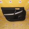 Обшивка двери Mazda CX-7 ER3P перед, лев