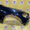 Крыло BMW X5 E70 '2007 перед, прав чёрное, с омывателем фары (царапины) 51657178396