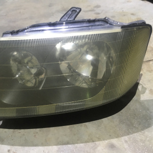 Фара MITSUBISHI лев RVR N71W Xenon черн.