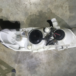 Фара NISSAN лев Bluebird Sylphy TG10