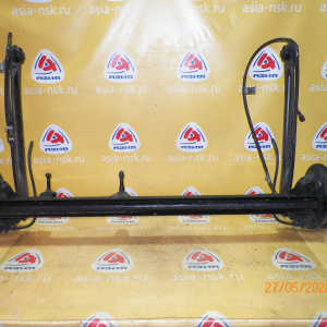 Балка Nissan P11/U14 Bluebird/Primera 2WD DISK. В сборе с тросами ручника. R 55501-3J020.55501-6J000