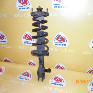 Стойка Mazda CP8W Premacy зад, лев Ухо в низу.