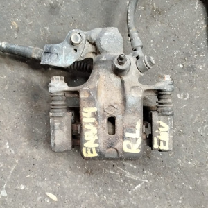 Суппорт NISSAN U14/P11 зад, лев 4WD