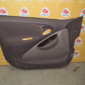 Обшивка двери Toyota Vitz/Platz NCP10 перед, лев