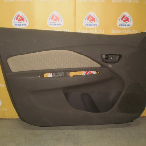 Обшивка двери Toyota Belta SCP92 перед, лев