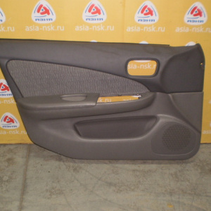 Обшивка двери Nissan Sunny B15 перед, лев