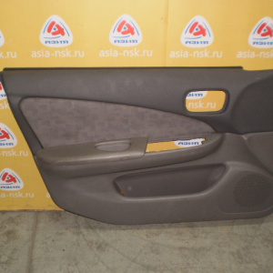 Обшивка двери Nissan Sunny B15 перед, лев