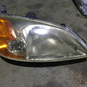 Фара HONDA прав Civic ES1