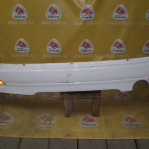 Бампер NISSAN Wingroad Y11 '1999-2001 зад (обвес)