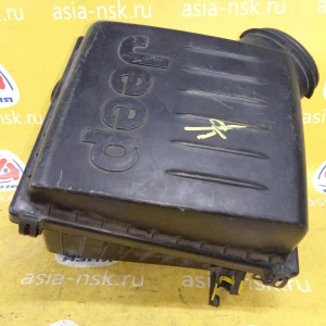 Корпус воздушного фильтра Jeep Grand Cherokee WJ/WG EVA 4.7L (дефект, скол на креплении) 04854043