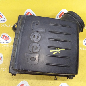 Корпус воздушного фильтра Jeep Grand Cherokee WJ/WG EVA 4.7L (дефект, скол на креплении) 04854043