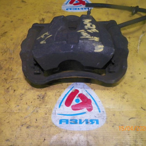 Суппорт Toyota NZE141/ZRE144/ZRT260 Corolla Fielder перед, лев Под диск 275мм