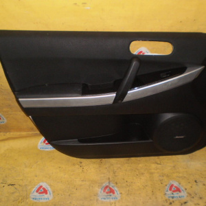Обшивка двери Mazda CX-7 ER3P перед, лев