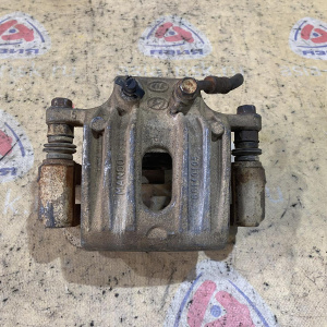 Суппорт Hyundai CM/BM Santa Fe '2006-2009 зад, лев 583102BA00