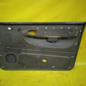 Обшивка двери Kia Sportage '1994-2006 K00 перед, лев 82301-1F020