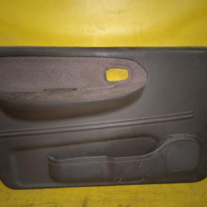 Обшивка двери Kia Sportage '1994-2006 K00 перед, лев 82301-1F020