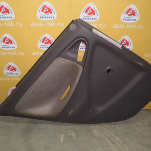 Обшивка двери Toyota Platz NCP12 зад, лев