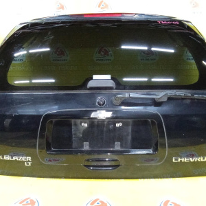 Дверь задняя Chevrolet TrailBlazer GMT360/KC '2003-2010 дефект пластика сверху