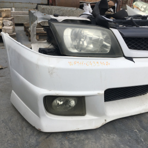 Ноускат Nissan Wingroad Y11 QG '1999-2002 a/t AEROS (без габаритов)(дефект крепления бампера) ф.1633 чёрн. т.2177