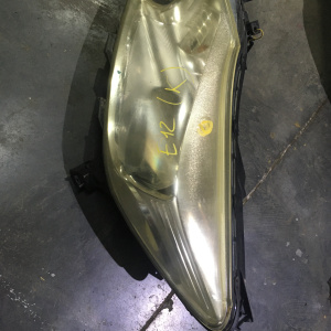 Фара NISSAN 1868 лев Note E12 '2012-2016 дефект крепления