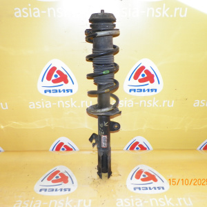 Стойка Nissan E12 Note перед, лев