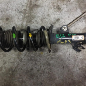 Стойка Nissan E12 Note перед, лев