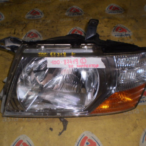 Фара MITSUBISHI 100-87419/20 лев Pajero V73W Хром (Эл.корректор)