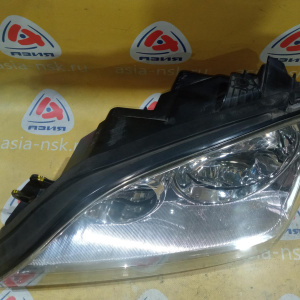 Фара Kia Sorento BL/FY '2002 лев фишка 4 конт. квадр. (трещинки на стекле и креплении) 92101-3E0