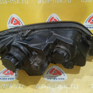 Фара Kia Sorento BL/FY '2002 лев фишка 4 конт. квадр. (трещинки на стекле и креплении) 92101-3E0