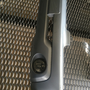 Бампер MITSUBISHI Pajero IO H76W '2000-2007 перед с туманками MR586656