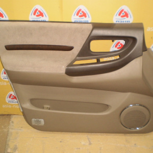 Обшивка двери Nissan Bassara/Presage U30 перед, лев