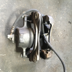 Суппорт Toyota ZGM11 Isis перед, прав 63-28