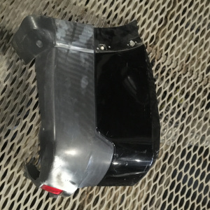 Клык бампера Mitsubishi Pajero V93W '2006-2010 зад, лев 6410A291