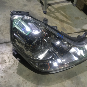 Фара NISSAN 1777 прав Wingroad Y12 дефект крепления