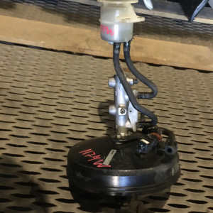 Главный тормозной цилиндр MITSUBISHI N74W RVR с вакуумником