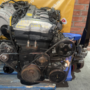 Двигатель Mazda FP-513524 2WD КАТУШКИ С БОКУ  без генератора Capella