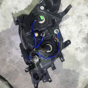 Фара Nissan 100-23682 лев Serena C26 '2013- галоген