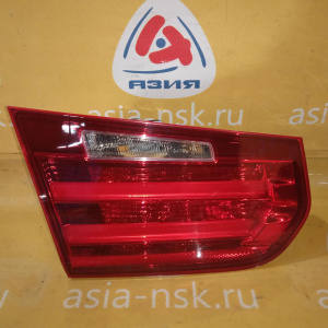 Стоп BMW 3-Series F30 '2013 L в крышку багажника, сломано направляющее крепление 63217259915