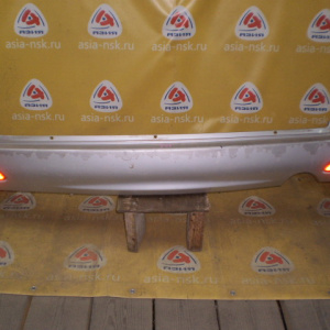 Бампер NISSAN Wingroad Y11 '1999-2001 зад (сонары) 85022 WD000