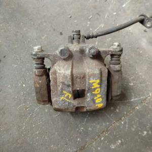 Суппорт Toyota M910A перед, лев Tank